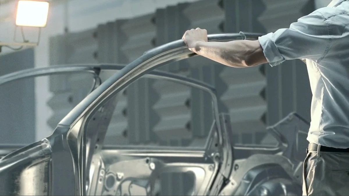 Using Physical Archives to Enrich Brand History in Corporate Videos