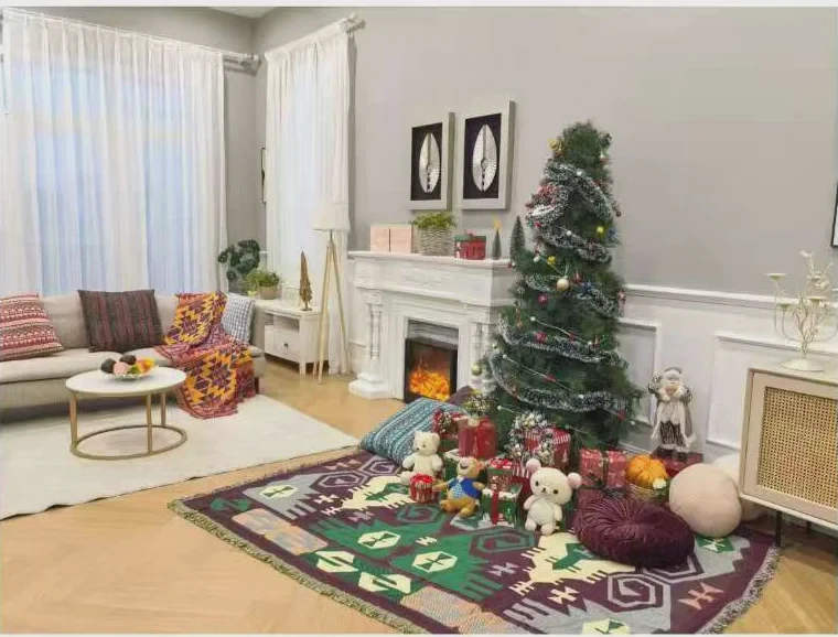 Family living room dressed with a fireplace, Christmas tree and seasonal props