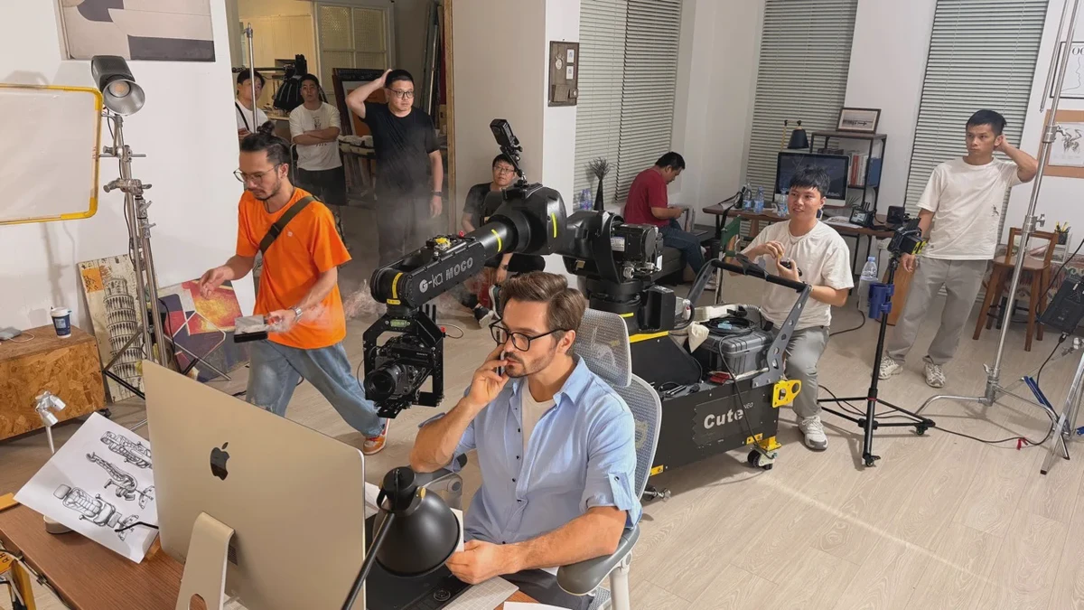 Film production setting with crew members and camera equipment